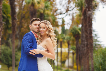 Fototapeta premium The bride and groom - the photograph in the Park.