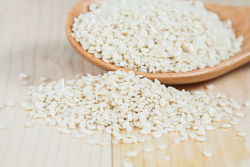 Sesame seeds in wood cup