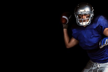 Composite image of american football player throwing ball