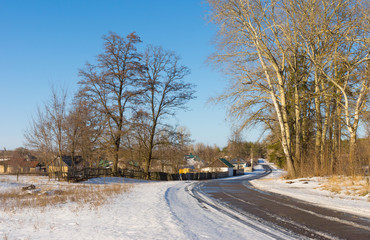 Winter landscape with road to Derevki village in central Ukrainian