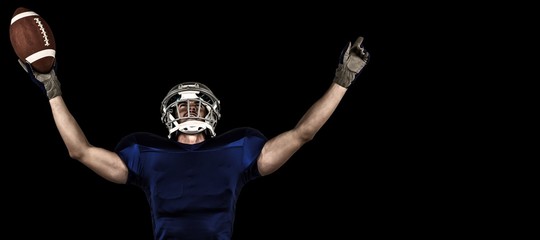Composite image of american football player gesturing victory