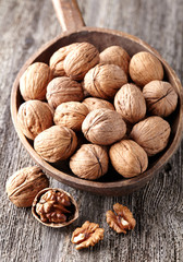 Walnuts in a wooden plate