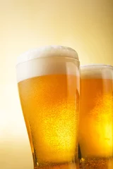 Zelfklevend Fotobehang ビール　Beer into glass © Nishihama