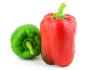 colored peppers over white background