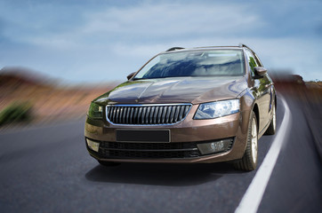 Car on the road.
Vagon car on road with motion blur background. - obrazy, fototapety, plakaty