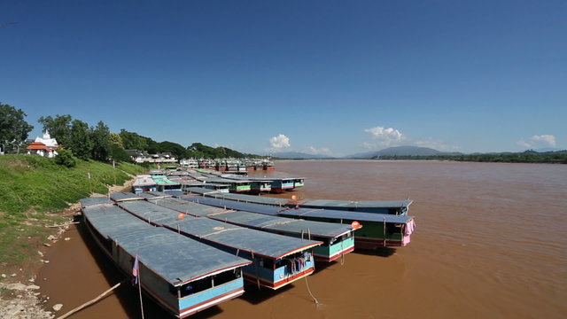 Laos and Chinese cargo boats in Mekong river at Chiang saen dock ,Thailand.