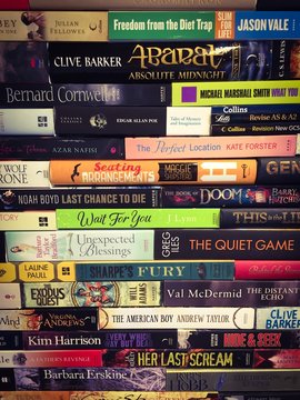 Wall of books piles up like bricks