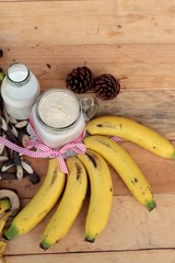 Ripe banana and smoothie banana with milk.