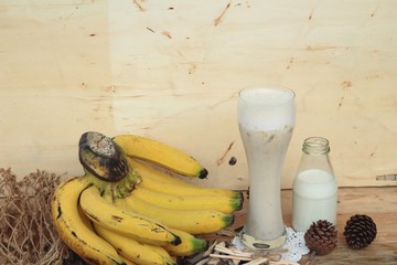 Ripe banana and smoothie banana with milk.