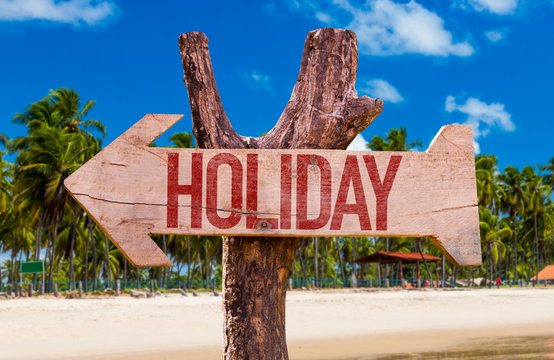 Holiday arrow with beach background