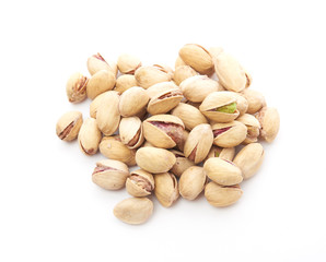 Heap of pistachios nuts isolated on the white