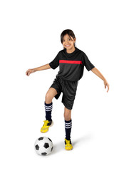 Young asian girl playing soccer, Isolated over white