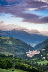 Beautiful foggy sunrise over the village of Preci in Umbria, Italy
