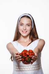 Girl with strawberries, healthy 