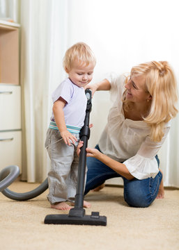 Family Have Fun With Cleaning With Hoover - Housework