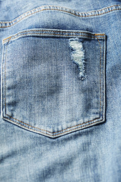Close up frayed jeans