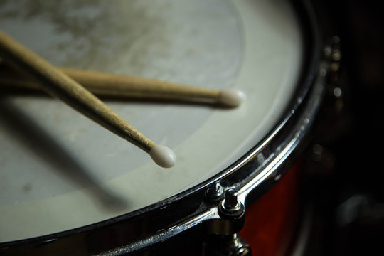 drums with drumsticks on it