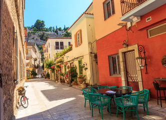 Fototapeta na wymiar Traditional old style street in Greece, Europe