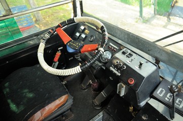 Steering wheel and empty driver's seat in trolleybus