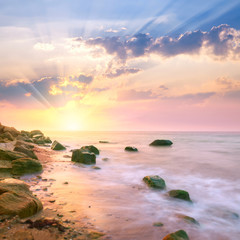 Fototapeta na wymiar Sunrise landscape over beautiful rocky coastline in the Ocean