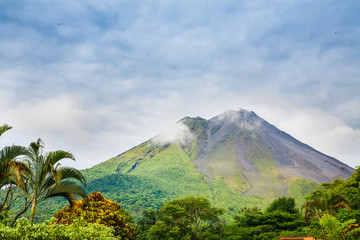 Arenal volcano, Costa Rica. Travel, vacation, tropical adventure and nature concept