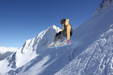 Naklejka na ściany i meble Flying skier on mountains, extreme sport