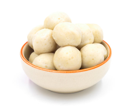 Fishballs in ceramic bowl on  white background.