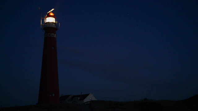 Lighthouse in the dunes at the island of Schiermonnikoog in the North of the Netherlands.