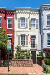 Washington DC row houses painted red, white, and blue. Location: Capitol Hill neighborhood