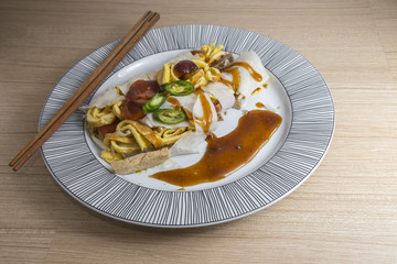 thai Fresh Spring Rolls on white dish wooden background