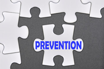 Fototapeta premium jigsaw puzzle written word prevention