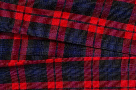 Red plaid fabric as background Stock Photo by ©yurinonori 37757029