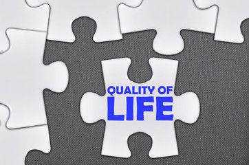 Fototapeta premium jigsaw puzzle written word quality of life