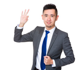 Asian Young Businessman with ok sign gesture