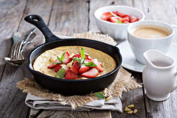 Baked pancake in cast iron pan