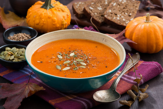 automn pumpkin soup in a bowl on table