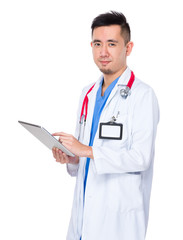 Young doctor use of the tablet pc