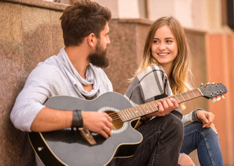 Couple with a guitar
