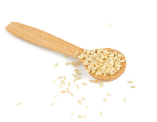 sesame seeds in a wooden spoon