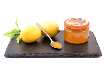 Stone bread and lemon homemade jam, close up 