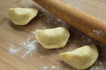 preparing dumplings / raw dumplings - polish pierogi