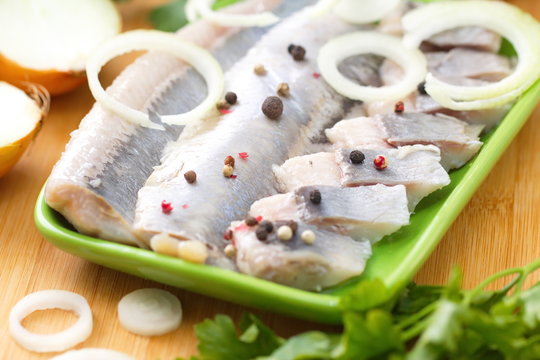 Herring fillet with herbs,onion and spices