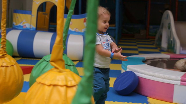 A little boy having fun on the playground