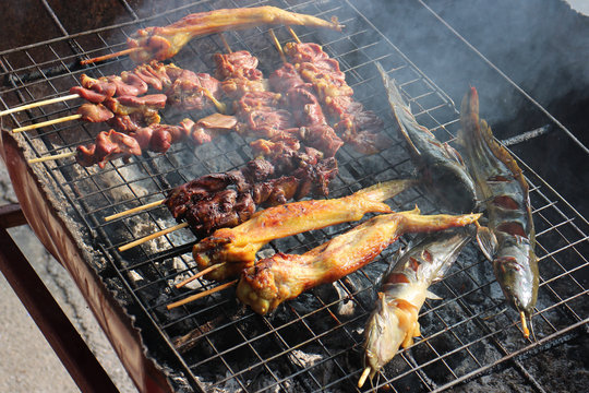 Asia local meat grill food on stove