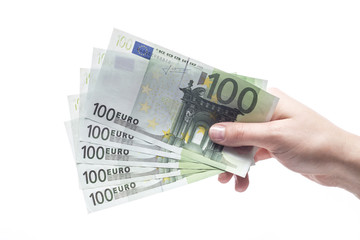 Kobieca dłoń z banknotami euro na białym tle - obrazy, fototapety, plakaty