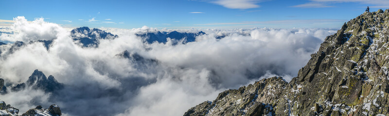Fototapeta premium Tatra Mountains above clouds - panorama