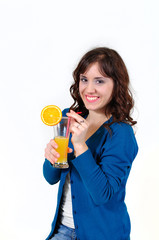 the girl drinks orange juice