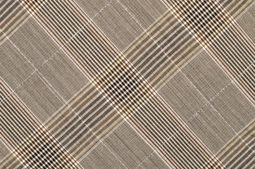 Brown guncheck pattern. Tartan design as background. Checked fabric.