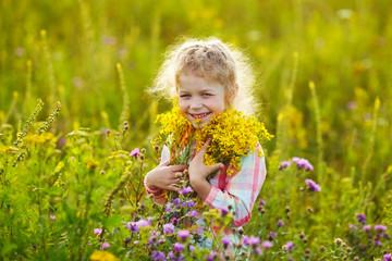 Happy girl with a bunch of flowers