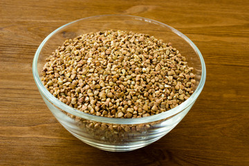 Buckwheat on wooden background